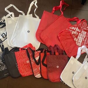 Lot of 14 lululemon shopping bags
